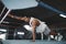 Sport. Man Doing Plank Workout On Boxing Ring. Handsome Asian Bodybuilder Training At Gym.