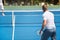 Sport, man and tennis on court with workout, competition and performance outdoor with fitness and energy. Athlete