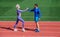 sport man and woman fitness partners celebrate team win with gesture of shake hand after exercising or compete in