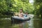 Sport recreation on kayak. Leisure tourism in canoe. Two friends swim in boat with oars. Kayaking. Canoeing