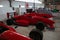 Sport Red racing formula cars in garage near mototrack