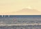Sport sailing yachts in regatta in the lake Llanquihue on the background of the volcano Osorno in Chile, South America