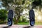 Sport shoes standing on old grunge sport floor with heart shaped lace with text running on blurred park with soft sunlight