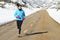 Sport woman running on winter