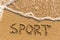 Sport - word drawn on the sand beach
