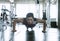 Sport. Young asian athletic man doing push-up muscular exercising in fitness gym