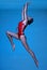 Sportive brunette woman in red swimsuit