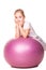 Sportive girl on a fit ball