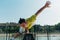 Sportive guy practicing parkour exercise in skate-park