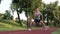 sportive man warming up with side lunge exercise outdoor stretching muscles, lunge exercise