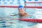 Sportive senior man in indoor pool