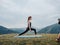 sportive woman doing yoga meditation mountains nature fresh air