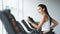 Sportive woman exercising on treadmill in gym