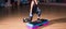 Sportive young woman with beautiful athletic body doing exercises with dumbbells close-up. Fitness, bodybuilding