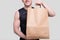 Sportman Holding Food Bag. Man with Paper Bag in Hands. Close Up Paper Bag in Hands. Healthy Eating, Healthy Food, Sport