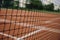 Sports activity background. Tennis, badminton net with synthetic court field outdoors