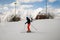 Sports athletes have fun while skiing in the winter on the top of snowy mountains