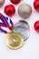 Sports award and Christmas toys, medal and red Christmas balls, winter competitions, new year`s holiday