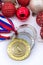 Sports award and Christmas toys, medal and red Christmas balls, winter competitions, new year`s holiday