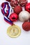 Sports award and Christmas toys, medal and red Christmas balls, winter competitions, new year`s holiday