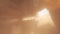 Sports car filmed from below while racing in clouds of dust