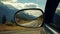 A sports car\'s side mirror