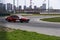 A sports car takes a turn in a skid