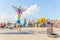 sports children show acrobatic stunts on the Volga embankment on a sports holiday on a sunny day