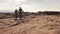 Sports, dunes and people cycling in desert on an adventure trail training for race or competition. Fitness, bicycle and