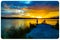 Sports Fishermen at Sunset early fall with beautiful water reflections and skyline over Ed Zorinsky lake Omaha Nebraska