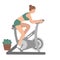 Sports at home. A girl trains on a stationary bike.