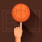 Sports illustration of hand spinning basketball