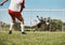 Sports man, soccer training and goal kick by soccer player on a soccer field with goalkeeper, energy and power. Football