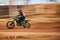 Sports, motorcycle and man in the countryside for fitness, adrenaline and speed training outdoor. Dirt road, bike and