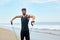 Sports. Portrait Of Man Exercising At Beach During Outdoor Workout