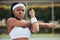 Sports, portrait and woman tennis player doing warm up for practice to play match at stadium. Fitness, serious and
