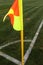 Sports referee flag at the stadium during a game of football