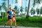 Sports. Runner Couple Running, Jogging On Road. Fitness, Healthy