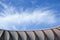 Sports stadium roof and clouds