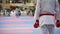 Sports teenagers - kid sportsmen at karate tatami - ready for fight