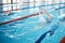 Sports, water splash or woman training in swimming pool for a race competition, exercise or cardio workout. Fast swimmer