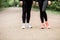 Sports women standing in the park alley