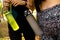 Sports women standing together with bottles of water after exercising