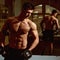 Sportsman, athlete with muscles looks attractive. Man with torso, muscular macho and his reflexion in mirror background