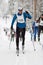 Sportsman in classic style cross country skiing race