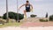 Sportsman doing long jump