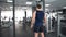 Sportsman lifting dumbbells in sport club, lateral raise exercise active leisure