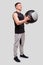 Sportsman with Medical Ball in Hands. Man Doing Workout with Medical Ball. Man Workout. Sportsman Standing with Sport