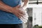 Sportsman rubbing white magnesium chalk powder with his hands