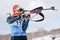 Sportswoman biathlete Yegorova Polina Kazakhstan rifle shoot standing position